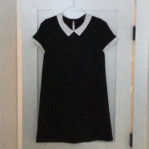 Black dress with white collar and trim on sleeves